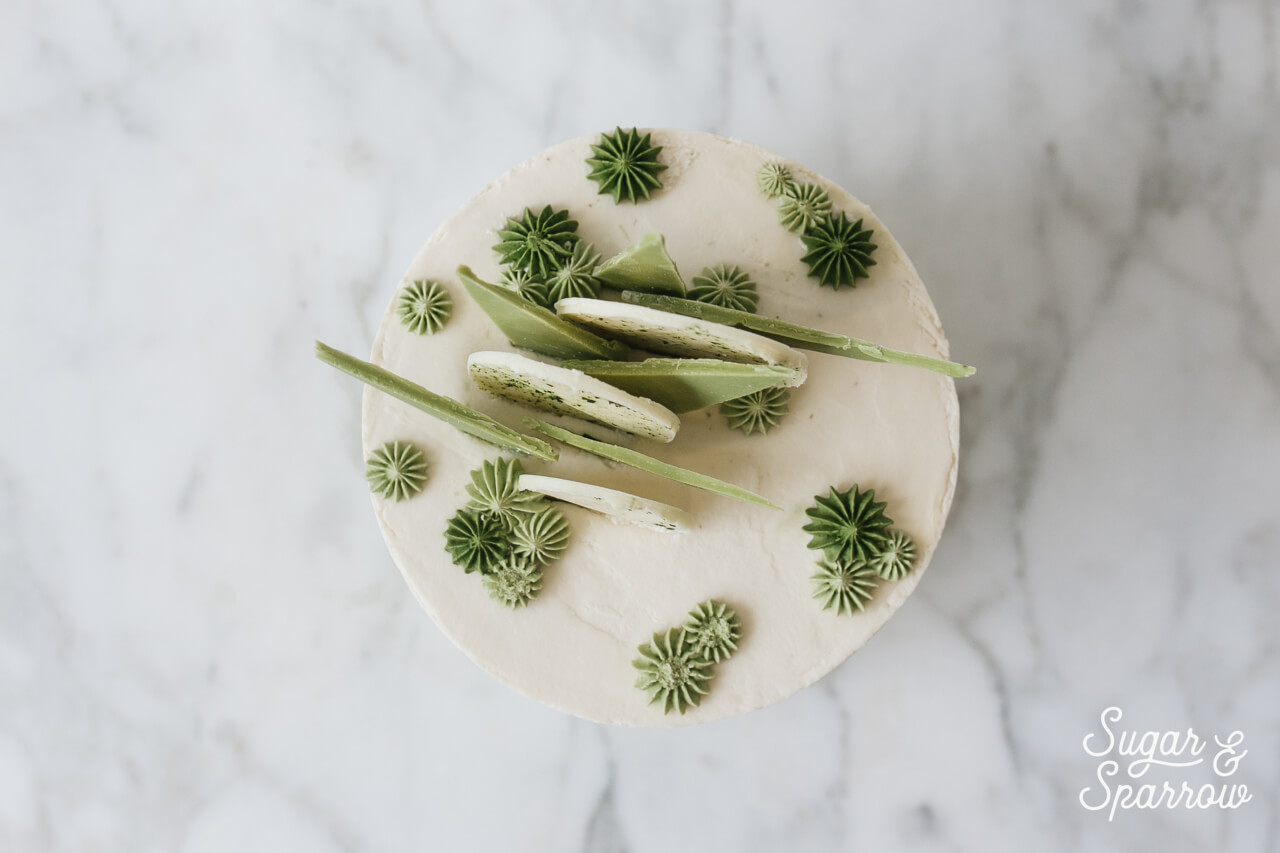 Matcha raspberry white chocolate cake by sugar and sparrow