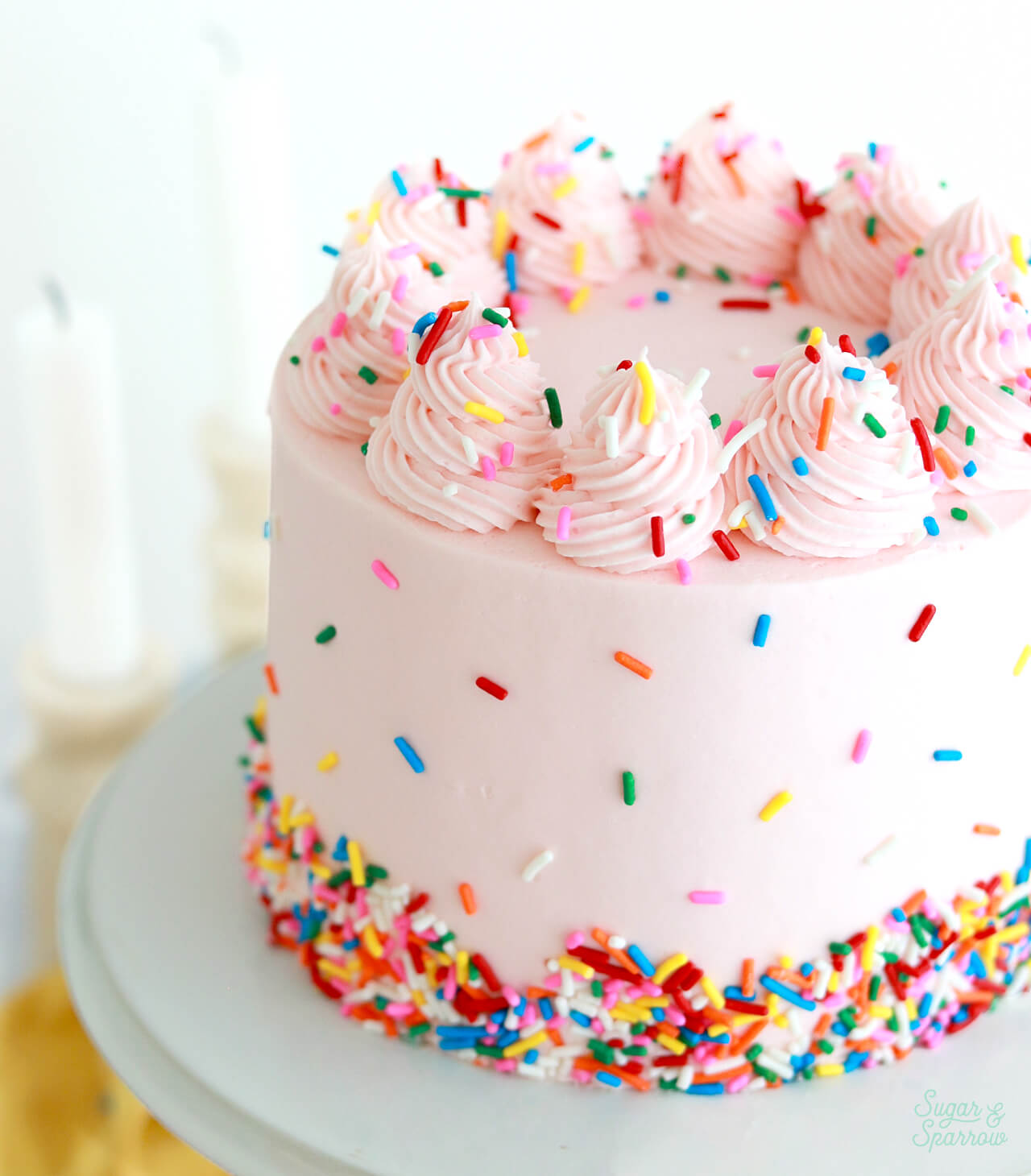 pink birthday cake with funfetti cake layers