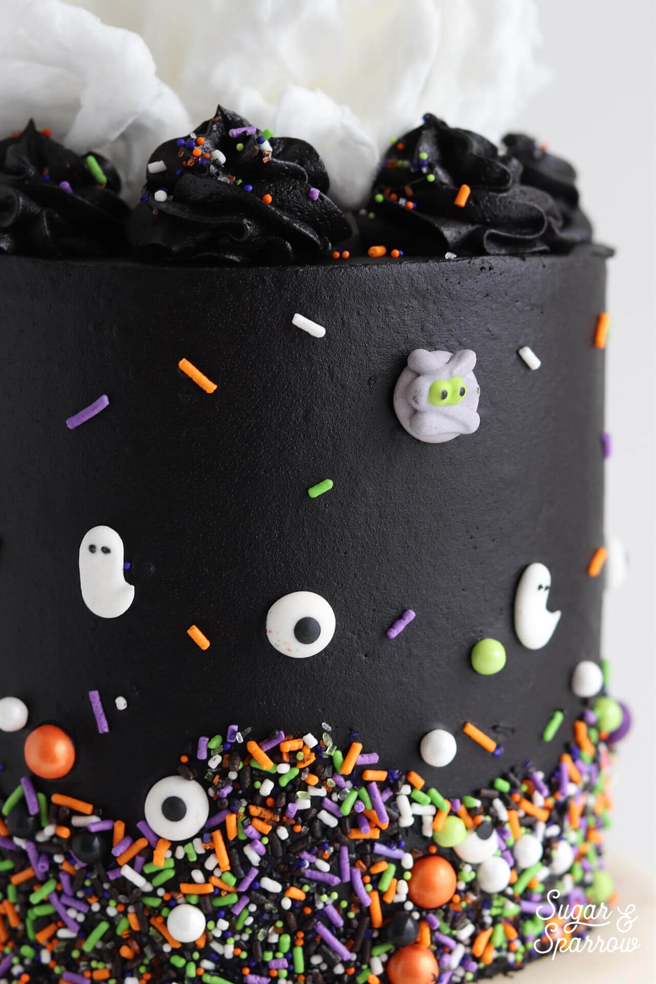 Spooky Black Buttercream Halloween Cake - Sugar & Sparrow