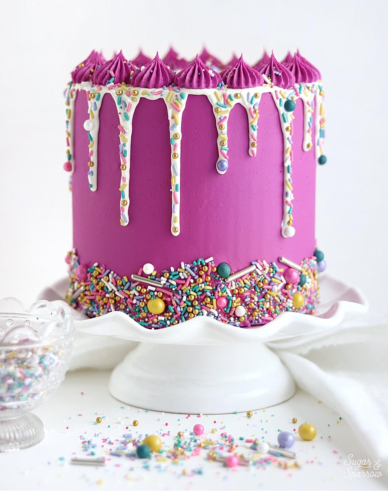 Pink and Gold Drip Cake with Sprinkles