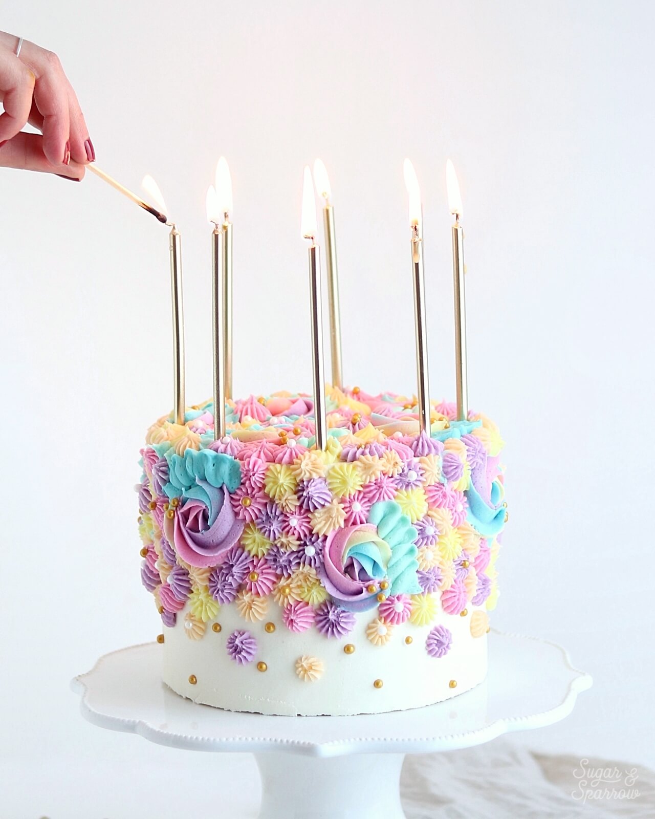 birthday cake with tall candles