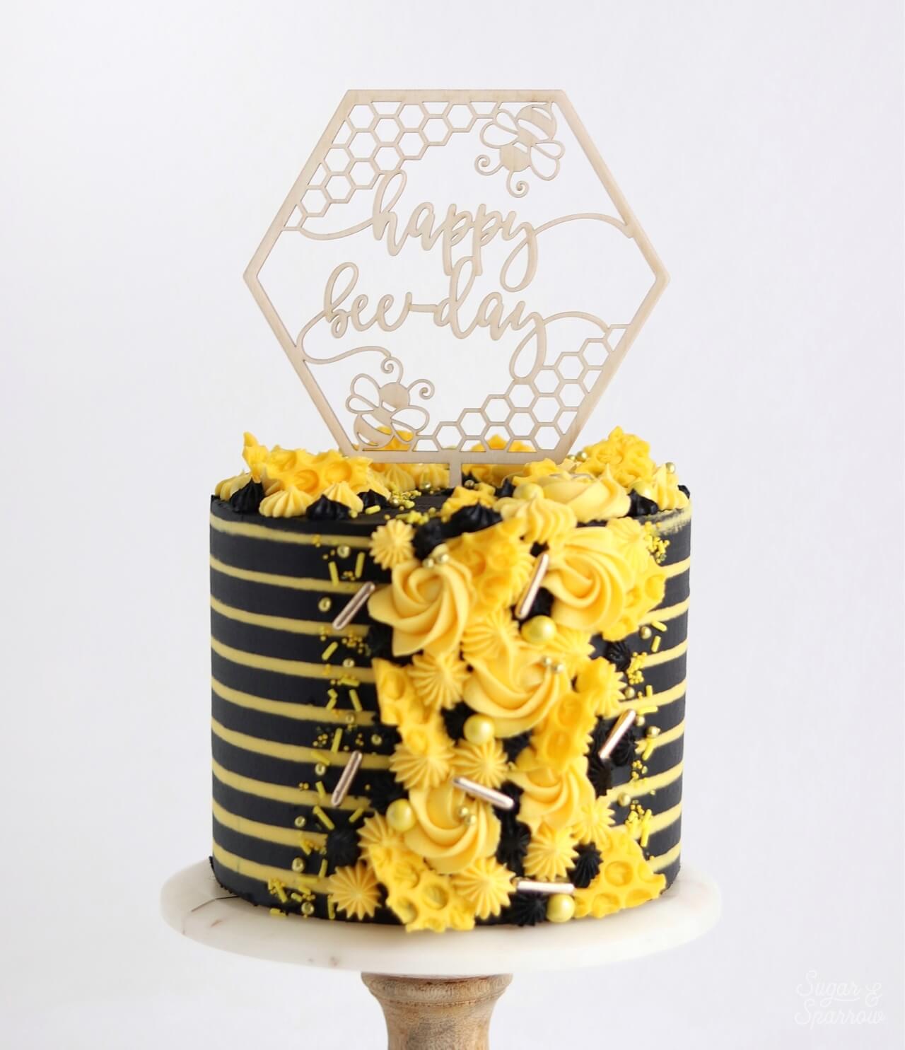 striped buttercream bee birthday cake