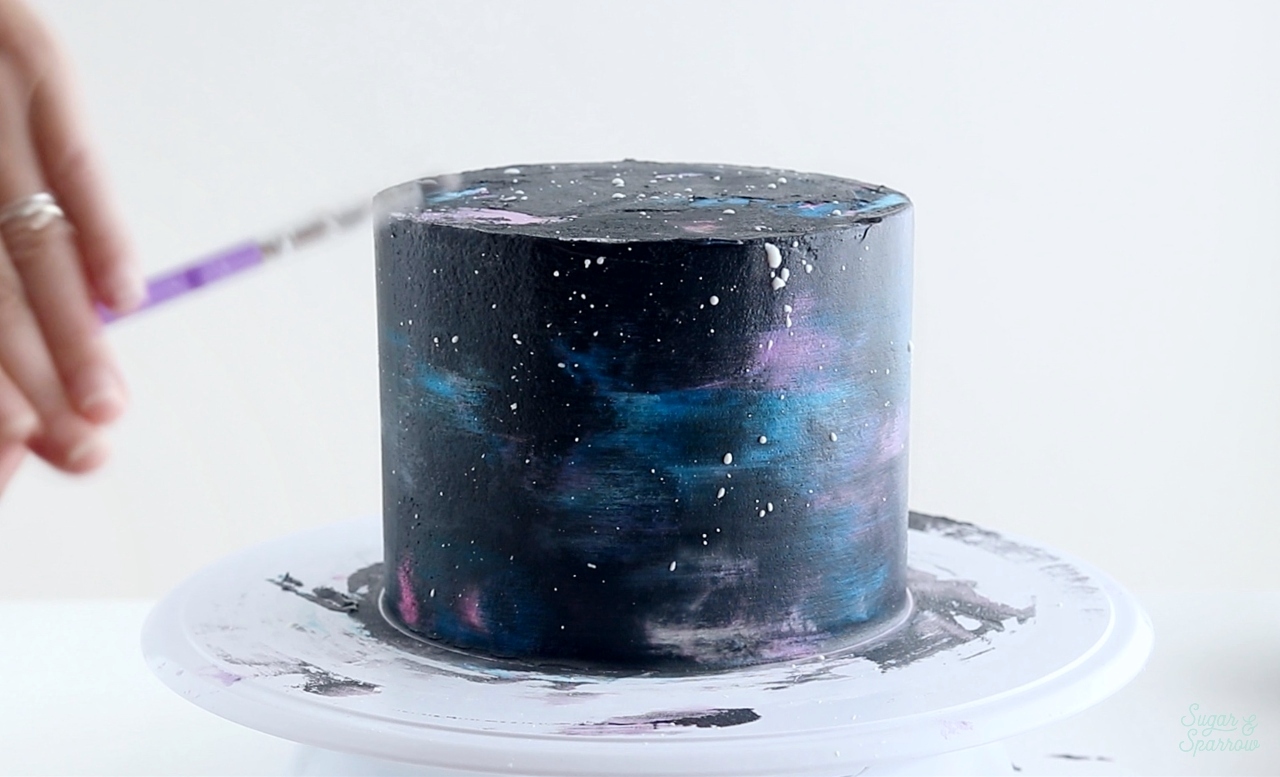 splatter painted galaxy cake