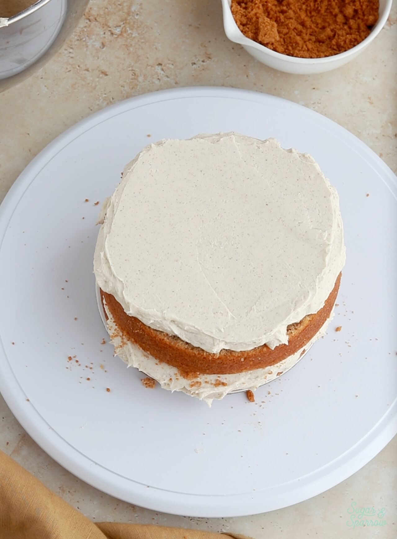 adding filling to a layer cake