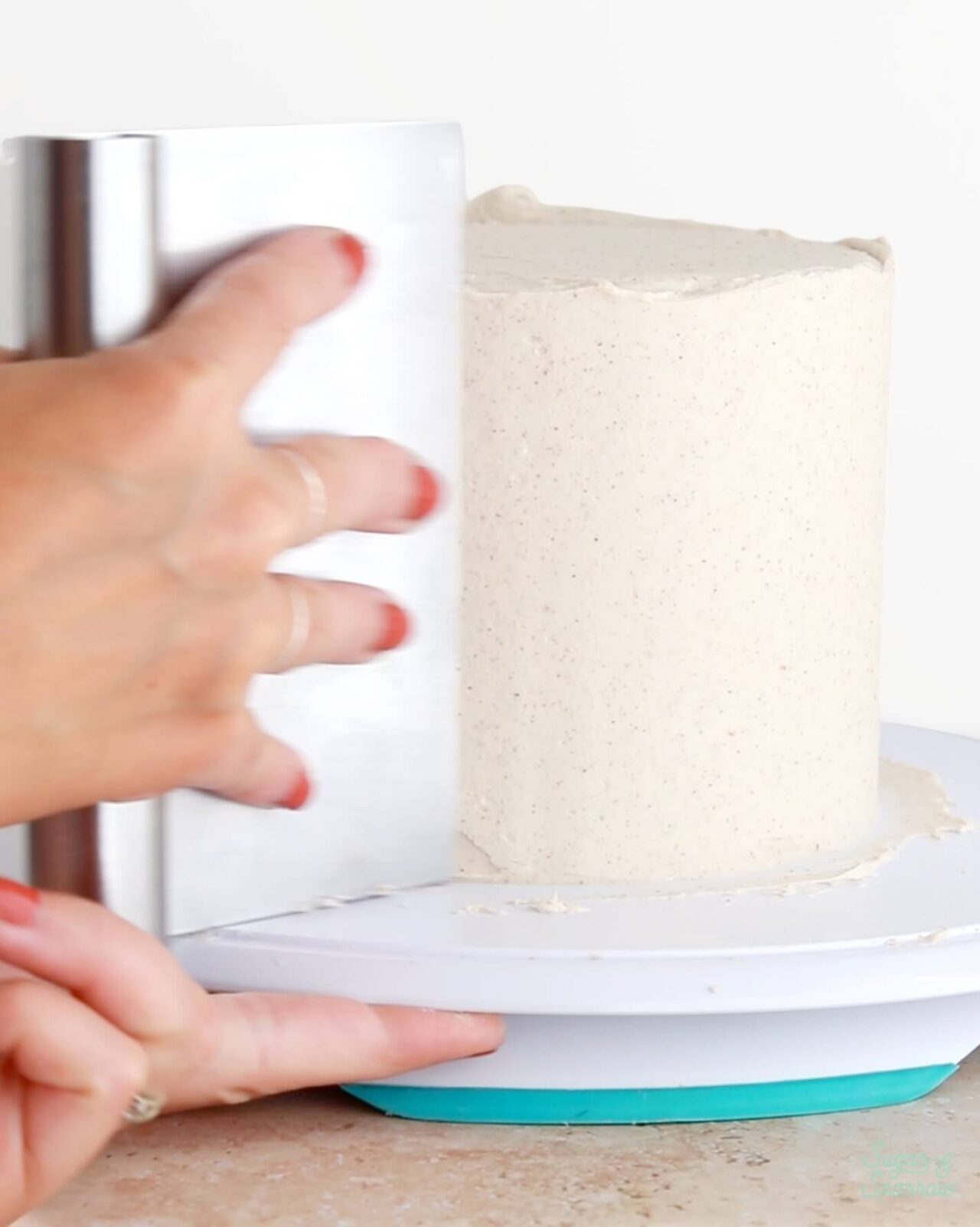 creating a smooth buttercream finish with chai frosting