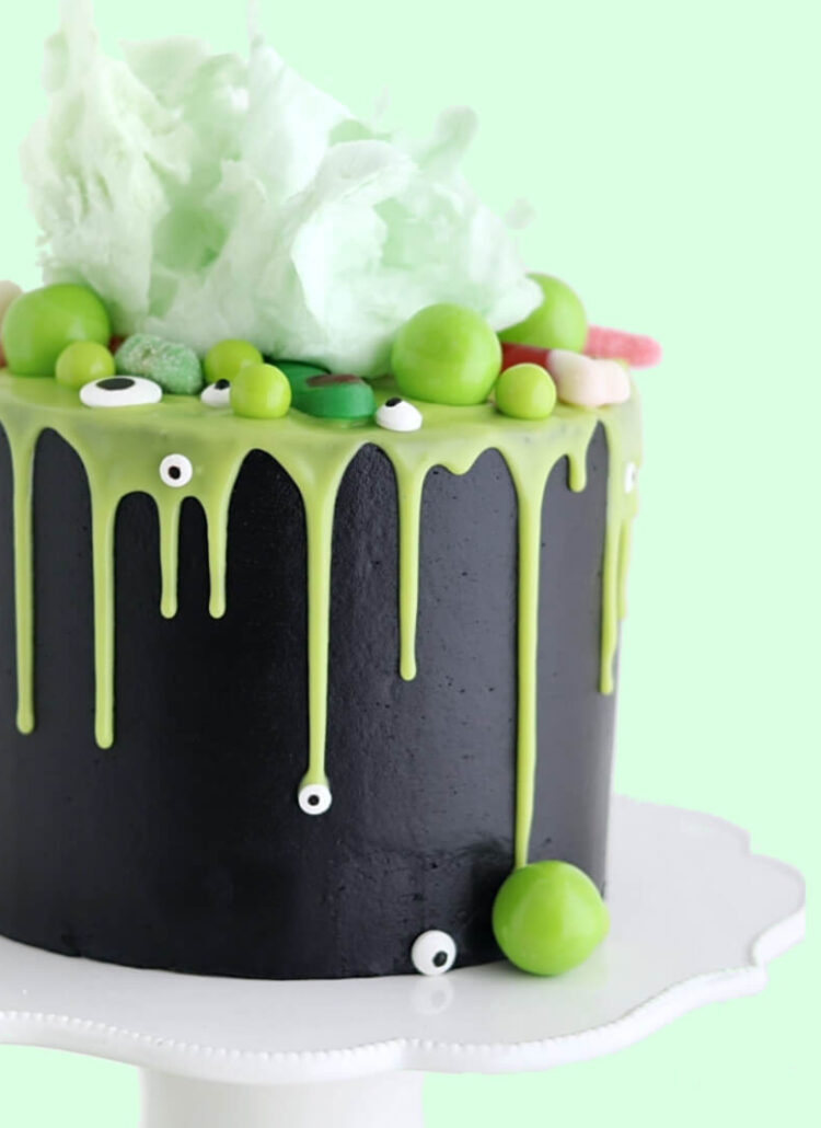 halloween witch cauldron cake by sugar and sparrow