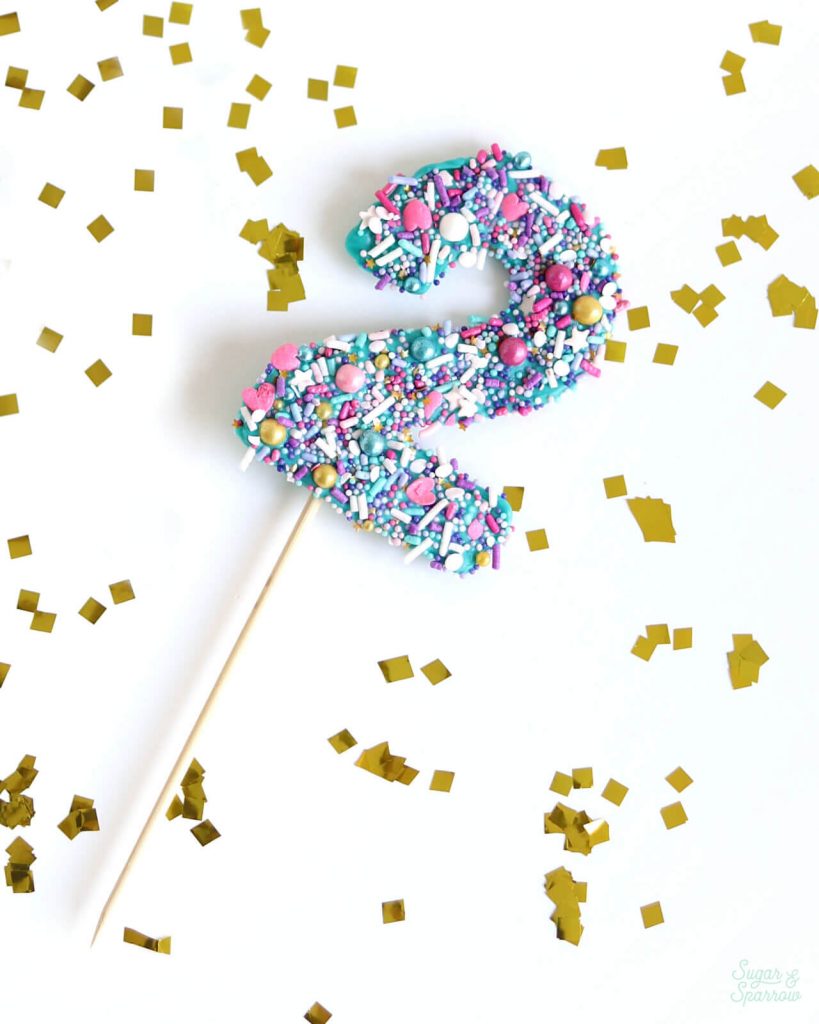 how to make your own cake topper number with chocolate and sprinkles