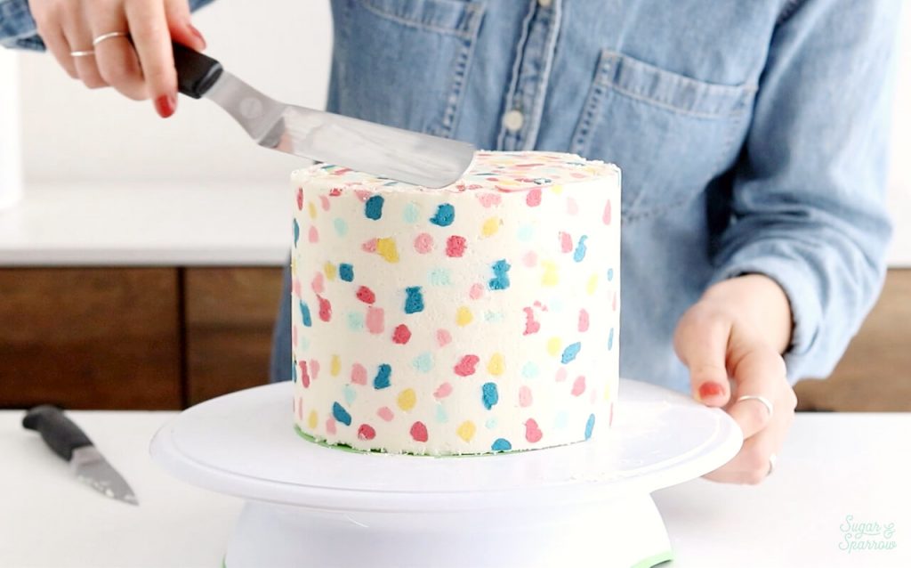 buttercream cake covered in terrazzo