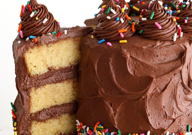 yellow cake recipe with chocolate frosting and rainbow sprinkles