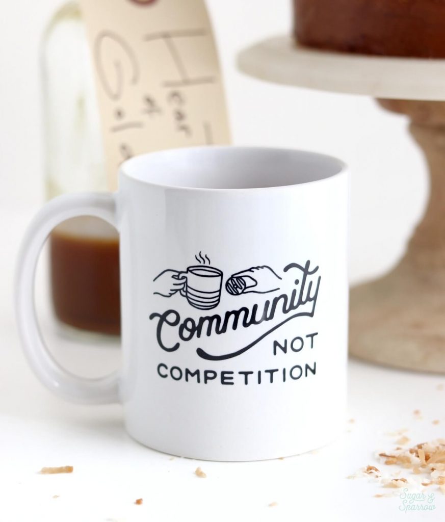 Community Not Competition coffee mug by Pip's Original