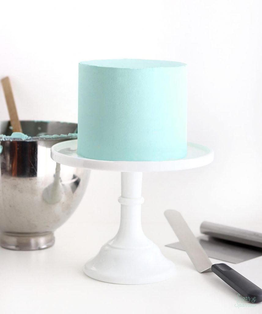 how to frost a cake with smooth buttercream tutorial