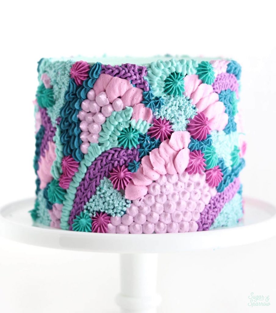 colorful buttercream cake by sugar and sparrow