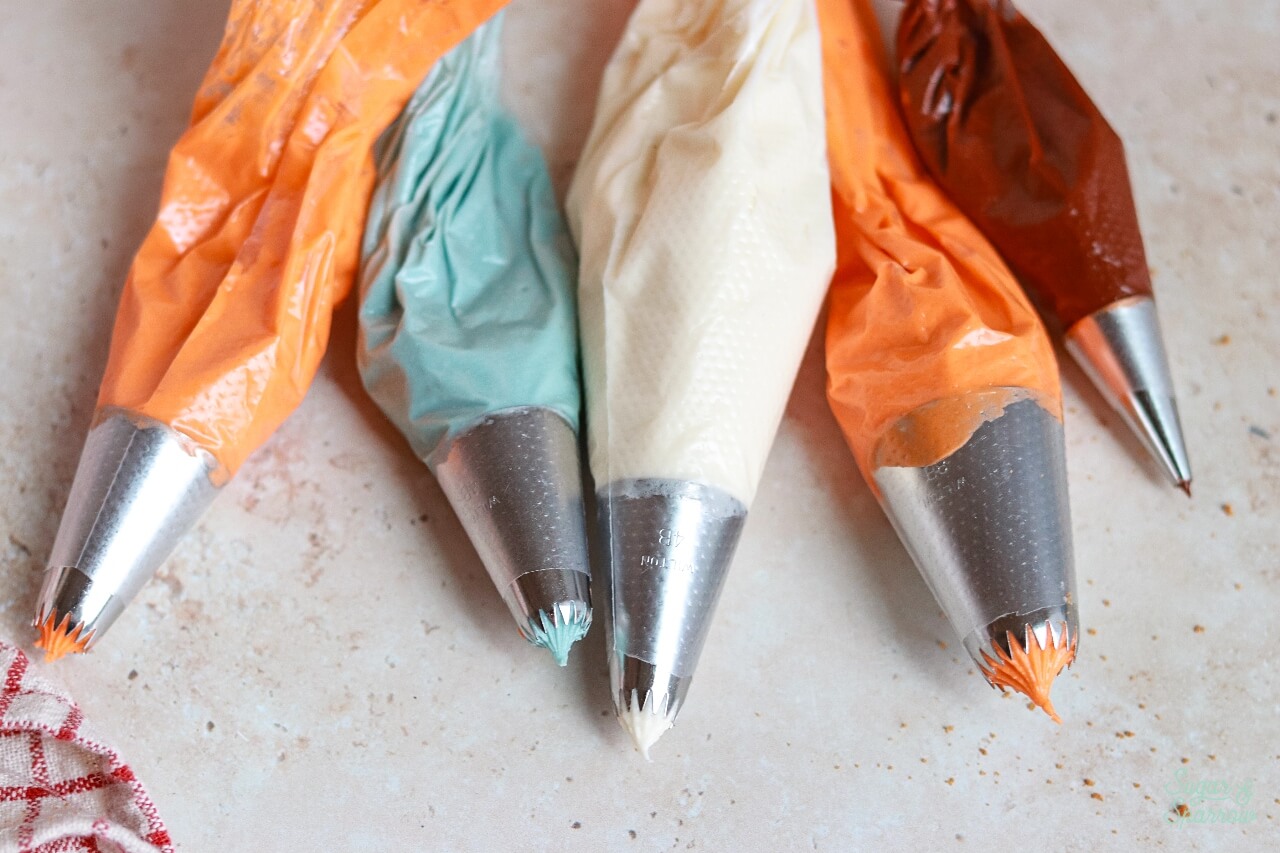 cream cheese frosting in piping bags