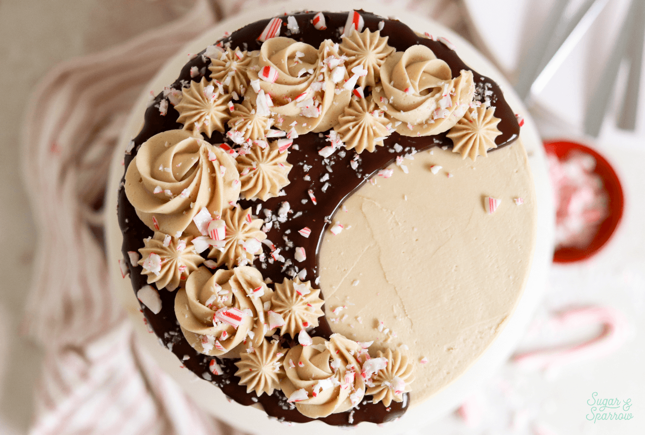 coffee buttercream piping on chocolate ganache drip cake
