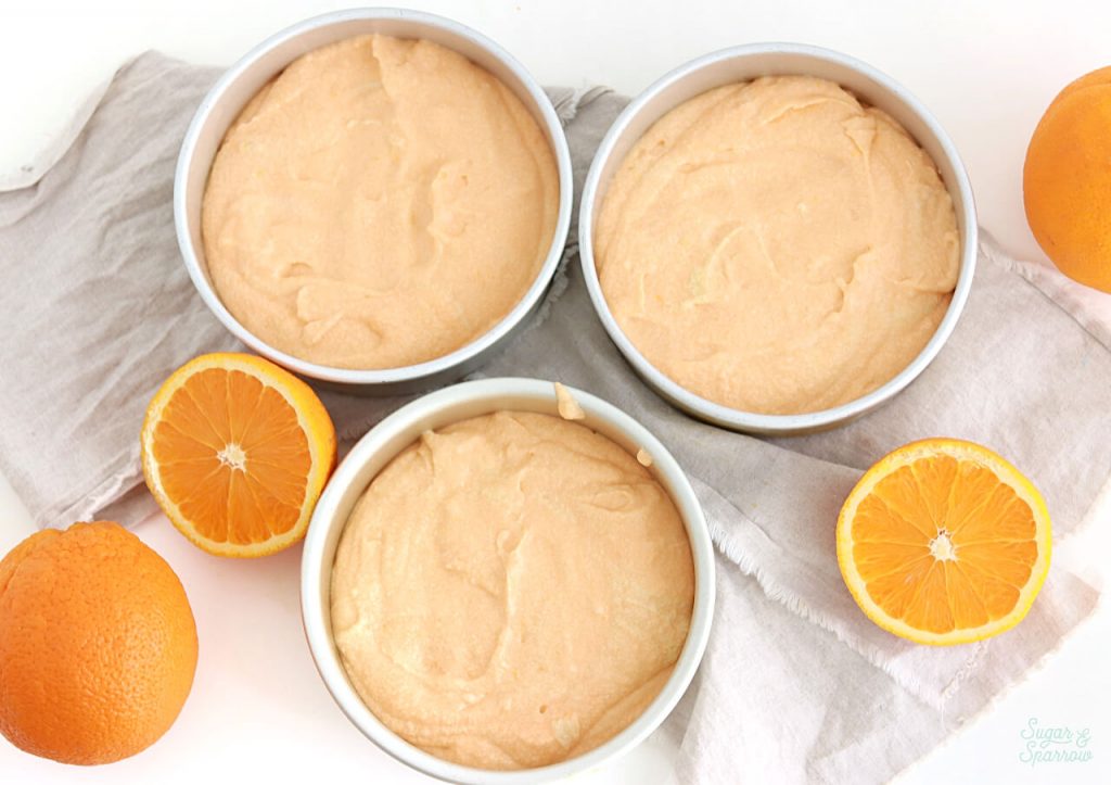 https://sugarandsparrow.s3.us-west-2.amazonaws.com/flour/wp-content/uploads/2021/07/13134915/Orange-Creamsicle-Cake-2-1024x723.jpeg