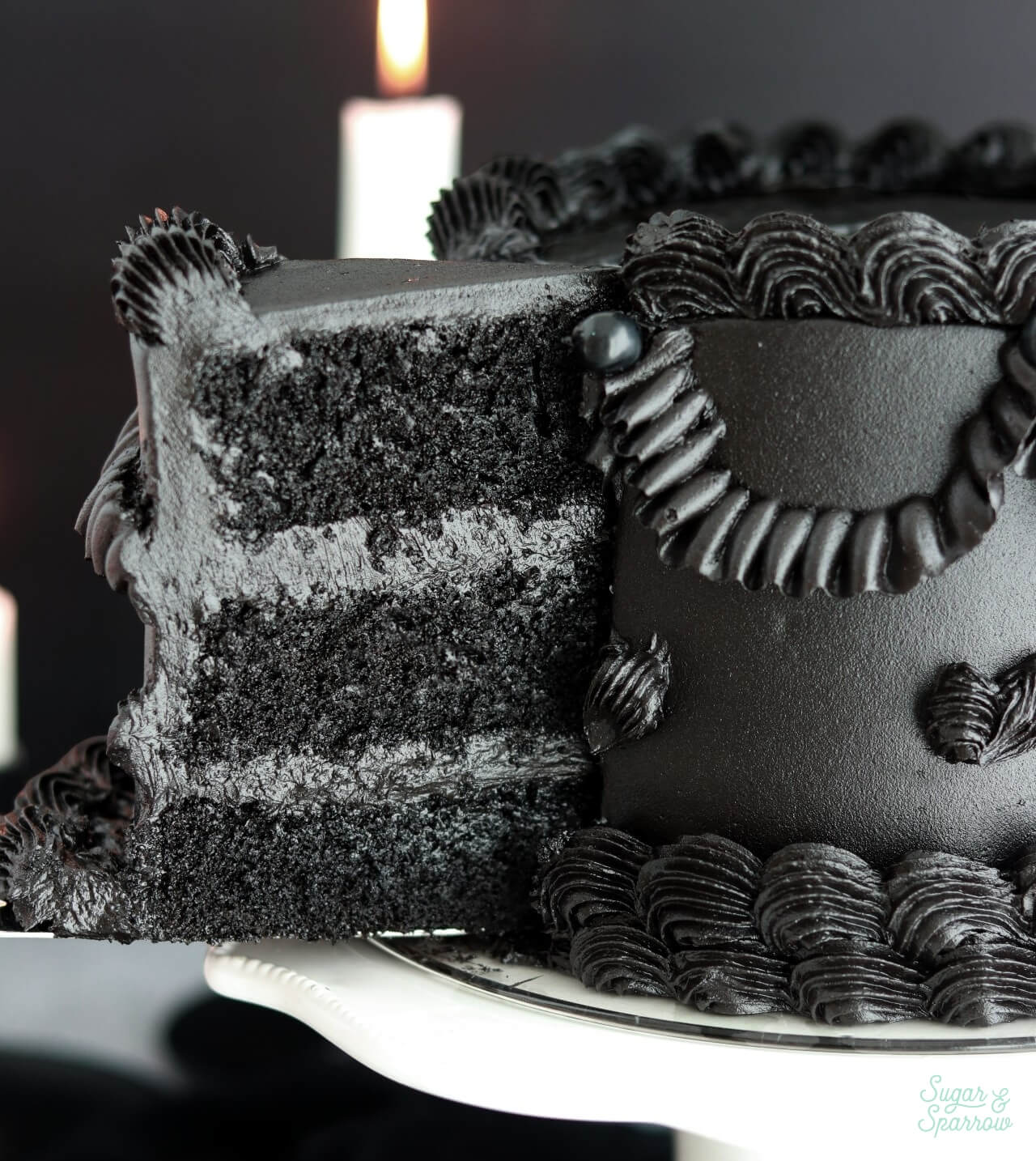 black velvet cake with and black frosting with black cocoa powder