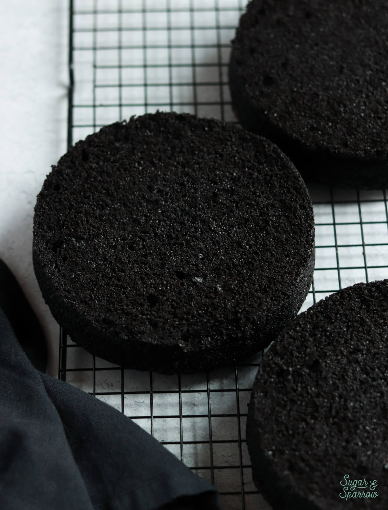 black velvet cake layers with the cocoa trader black cocoa powder