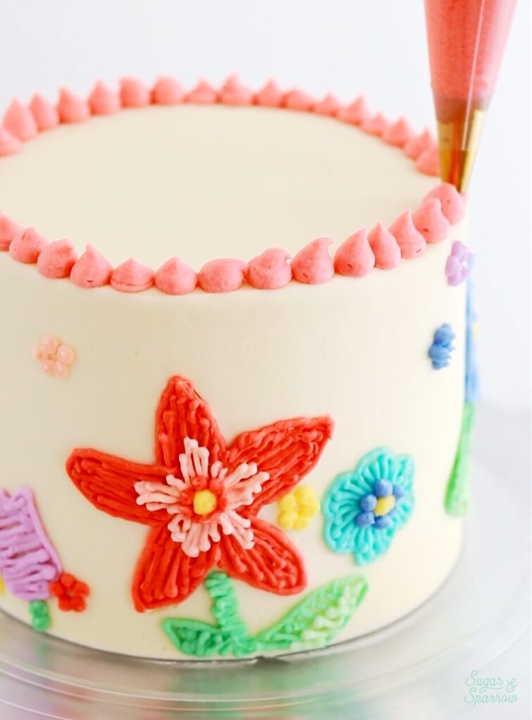 https://sugarandsparrow.s3.us-west-2.amazonaws.com/flour/wp-content/uploads/2023/03/15211828/Buttercream-Embroidery-Cake-Tutorial-15-756x1024.jpeg