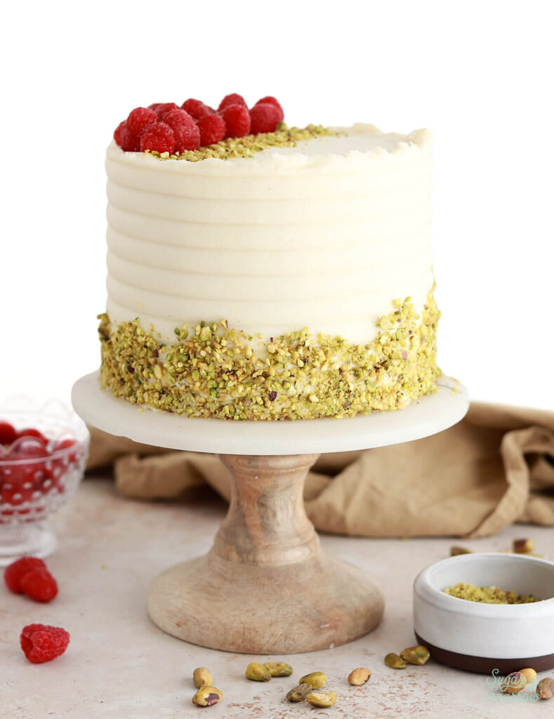 Raspberry Pistachio Cake with Mascarpone Buttercream - Sugar & Sparrow