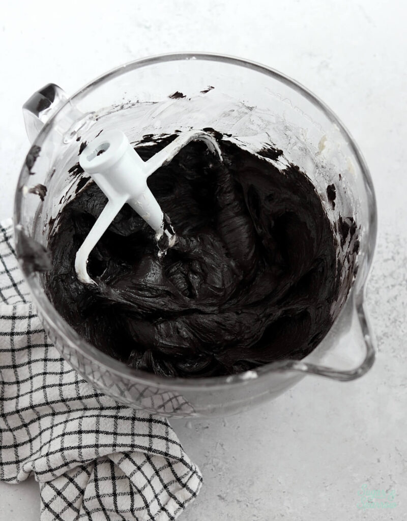 Black Buttercream Recipe with Minimal Food Coloring - Sugar & Sparrow