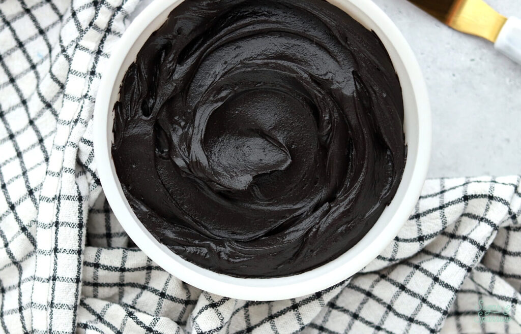 Black Buttercream Recipe with Minimal Food Coloring - Sugar & Sparrow