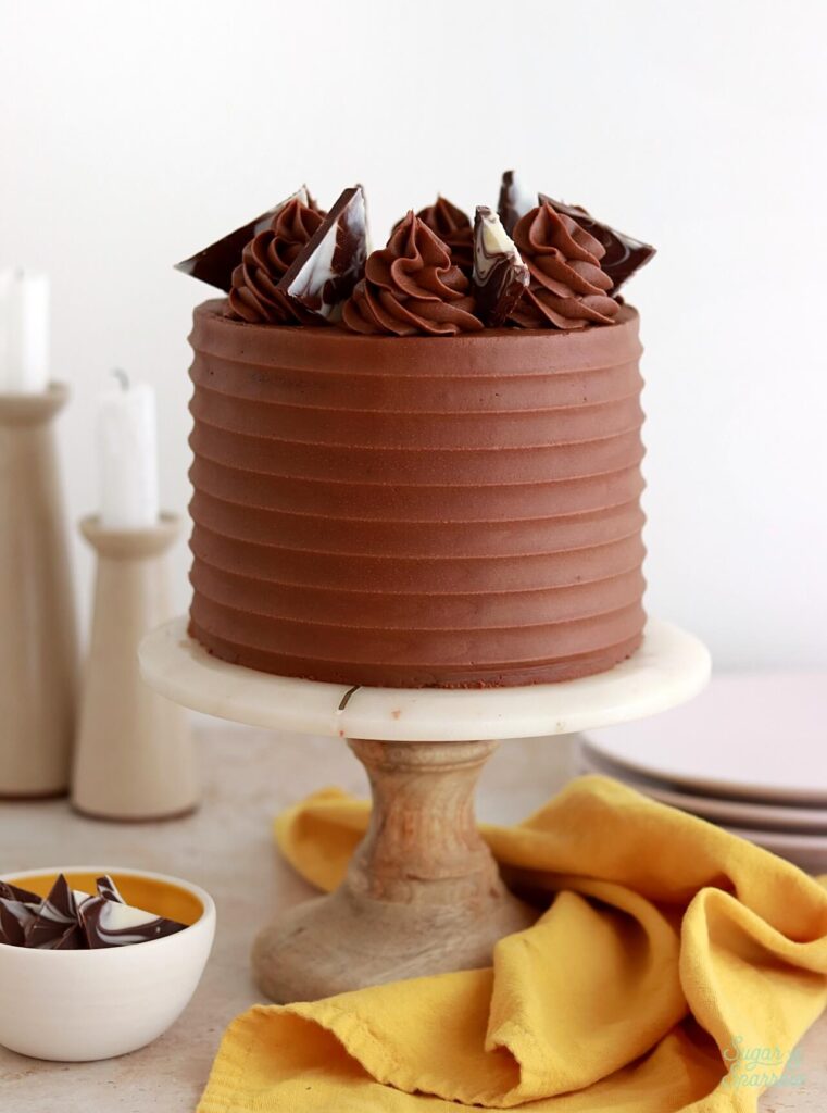 scalloped cake comb with chocolate buttercream