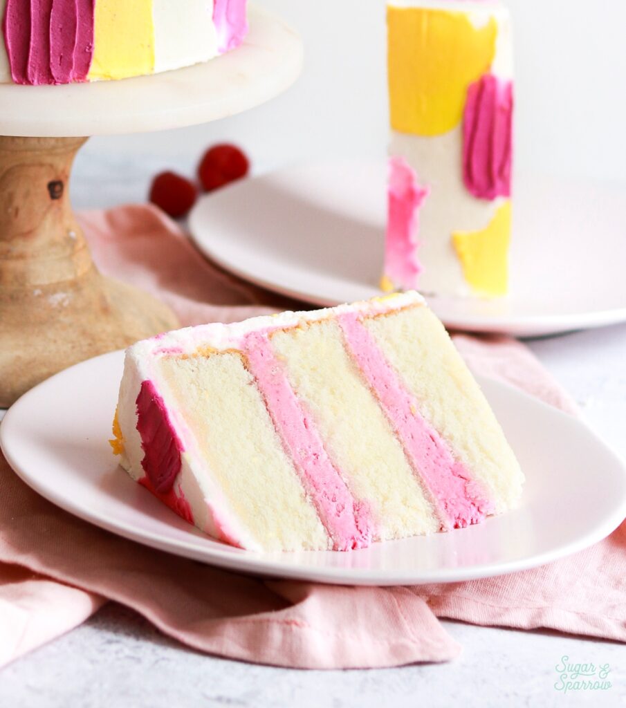 lemon raspberry cake by sugar and sparrow