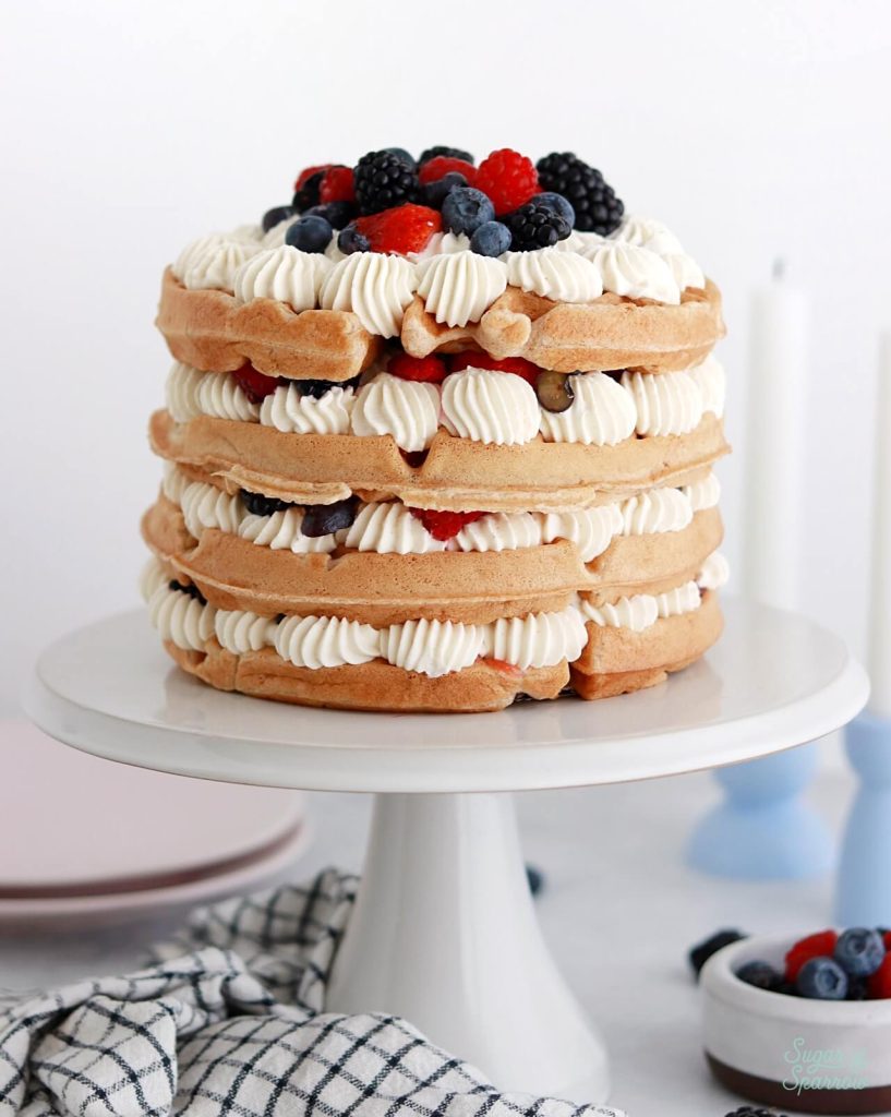 belgian waffle cake with mascarpone cream frosting and berries