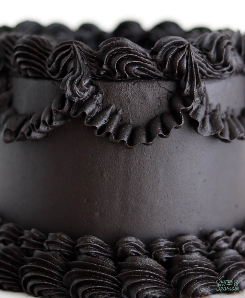 dye free black buttercream recipe by sugar and sparrow