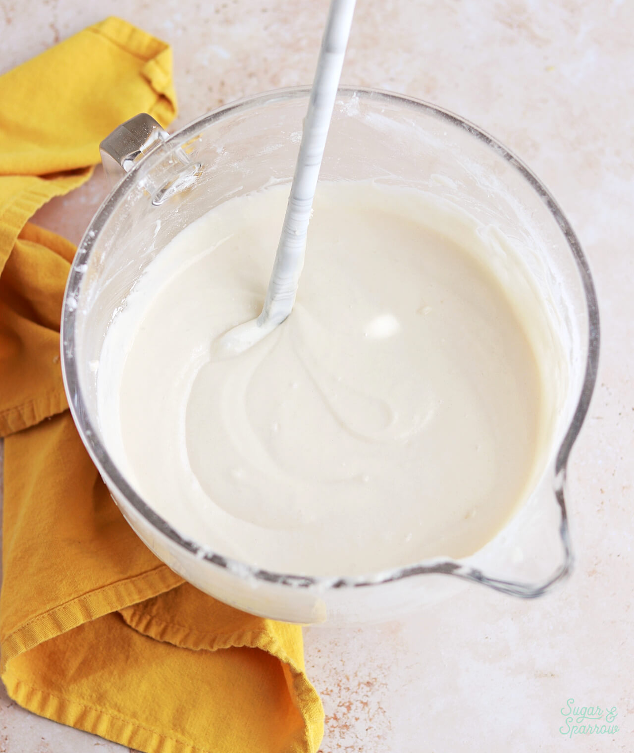 white cake batter in a mixing bowl