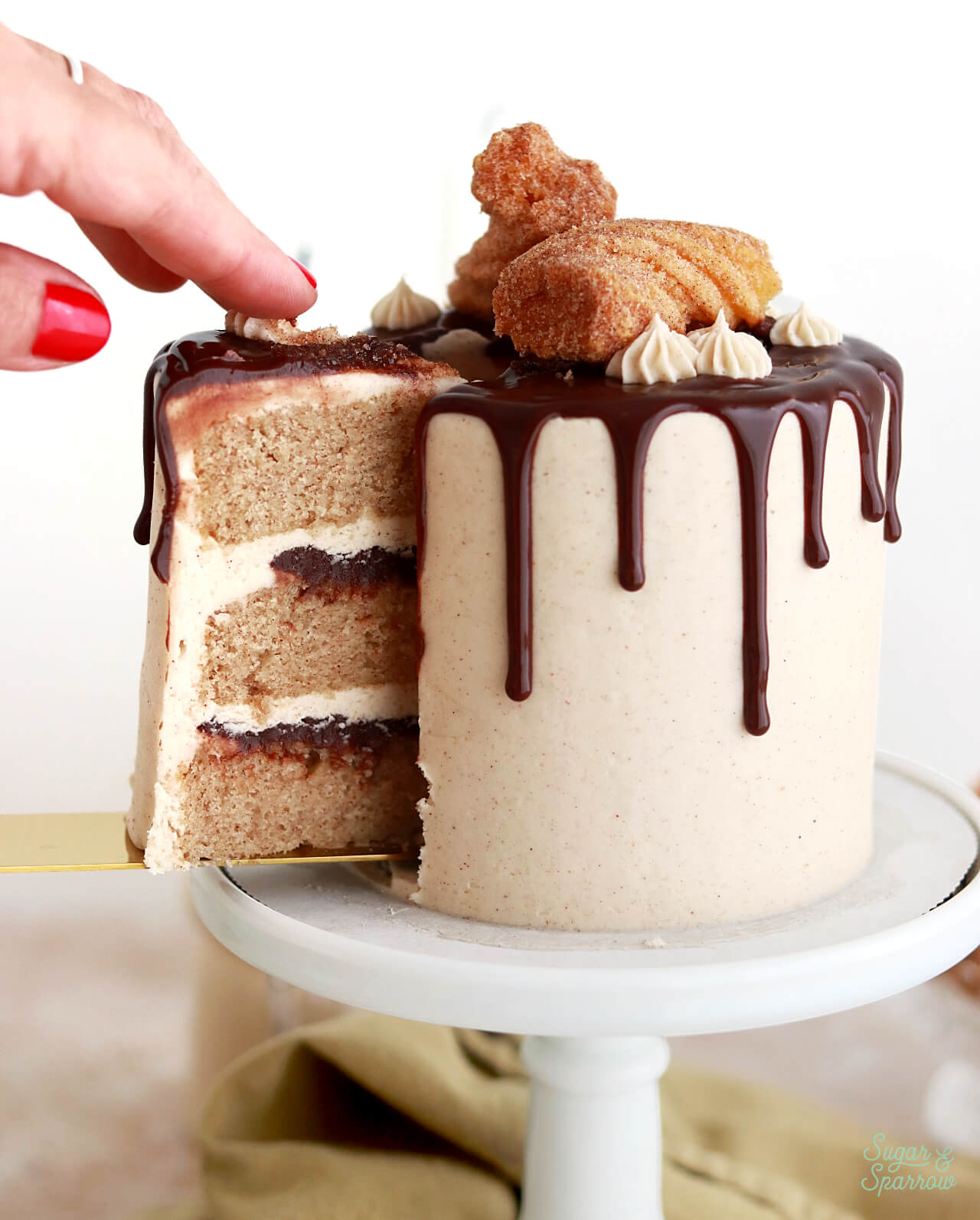 mini churro cake with mexican chocolate ganache and cinnamon vanilla buttercream