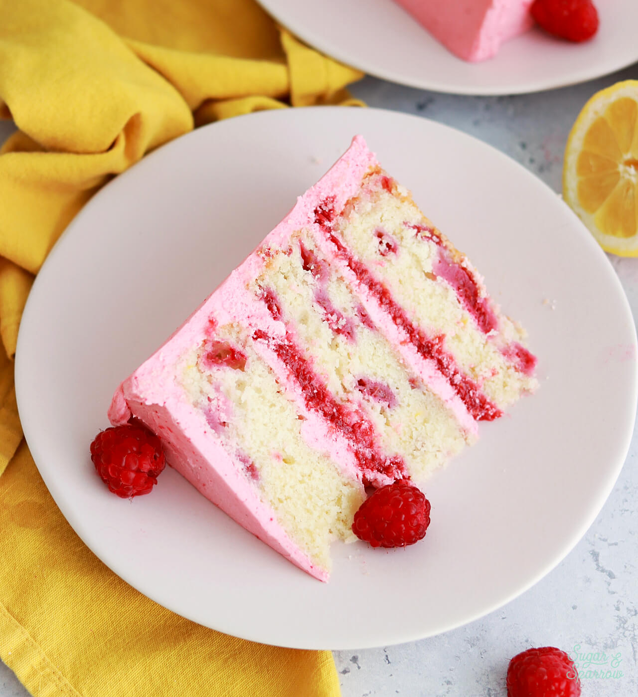 lemon layer cake with raspberries baked inside 
