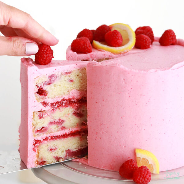 lemon raspberry layer cake with raspberry filling and lemon raspberry frosting