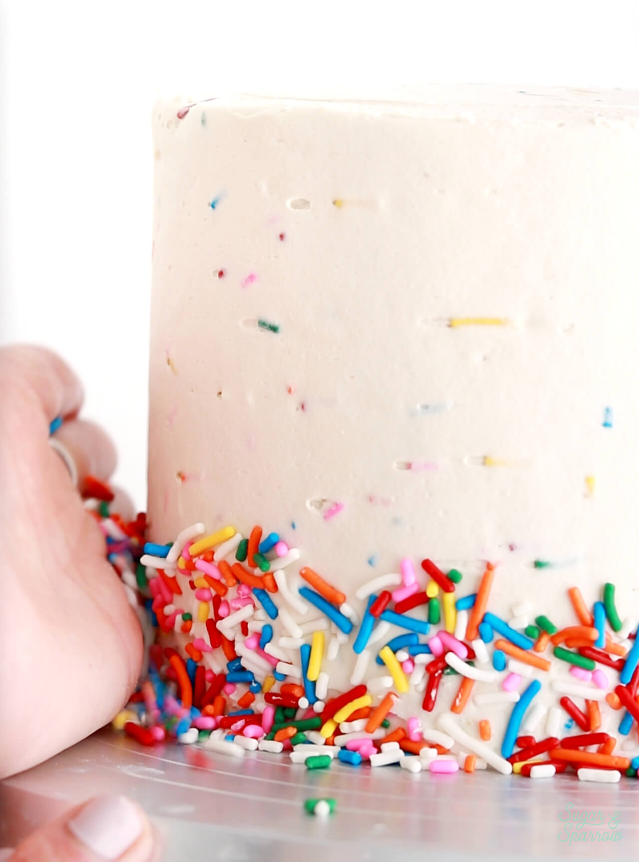 how to add a sprinkle border to the bottom of a cake