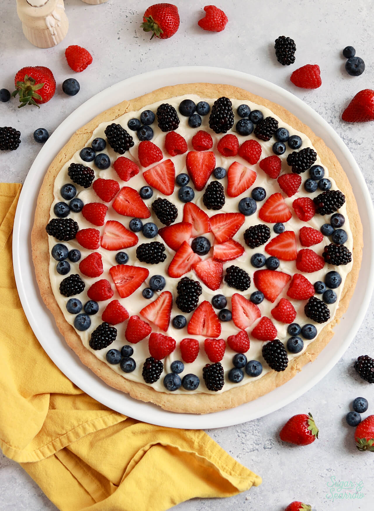 berry fruit pizza recipe by sugar and sparrow
