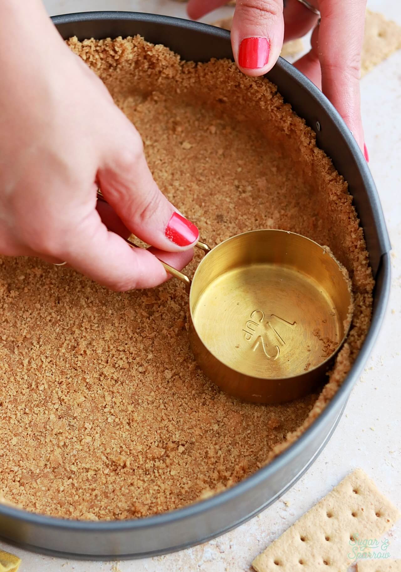 how to press graham cracker crust into pan