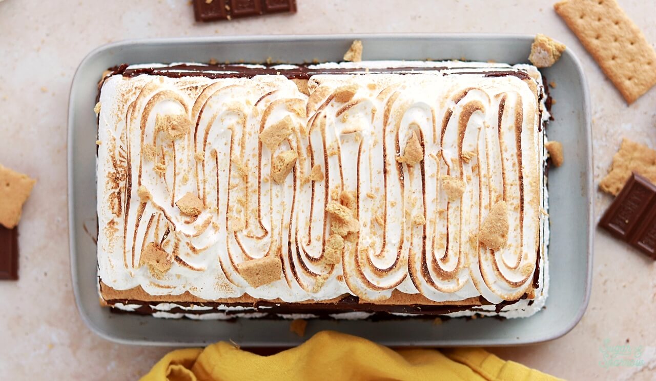toasted marshmallow meringue on top of smores cake