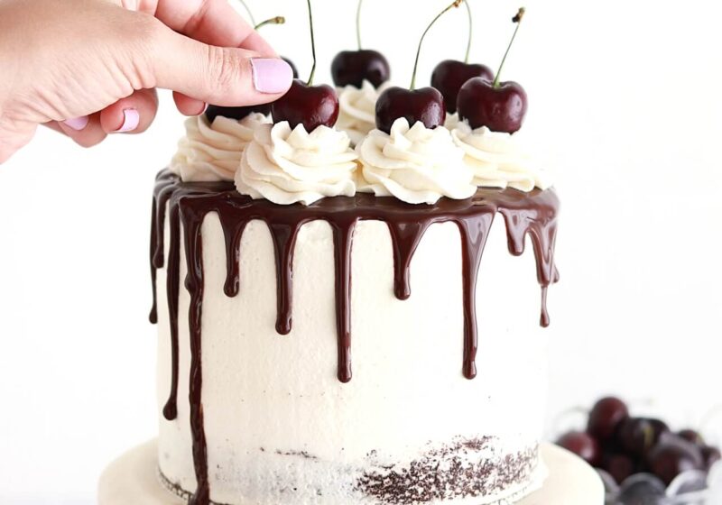 black forest cake recipe with homemade cherry filling and whipped cream frosting