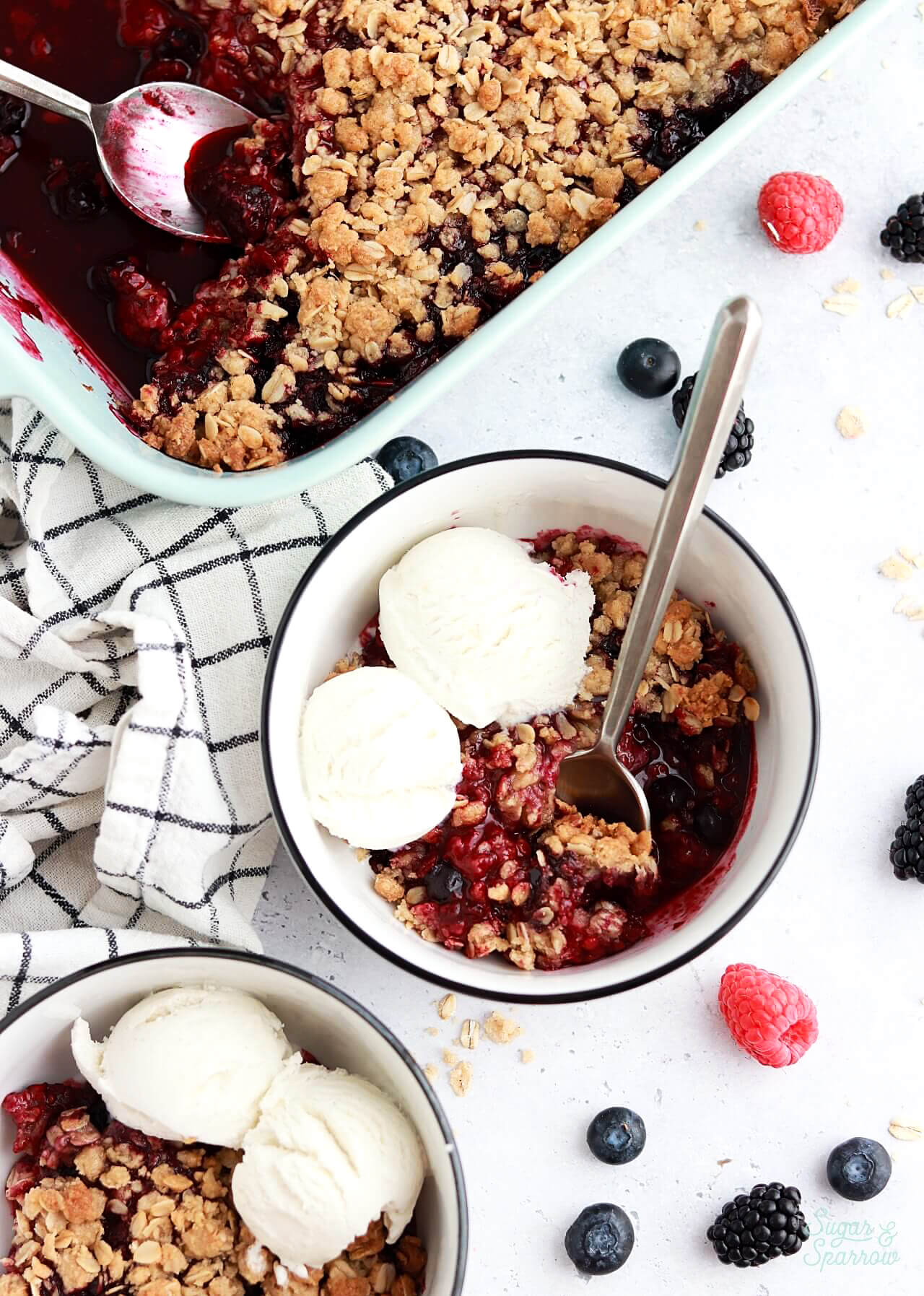 triple berry crisp recipe by sugar and sparrow