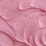 adding fresh blackberries to buttercream recipe