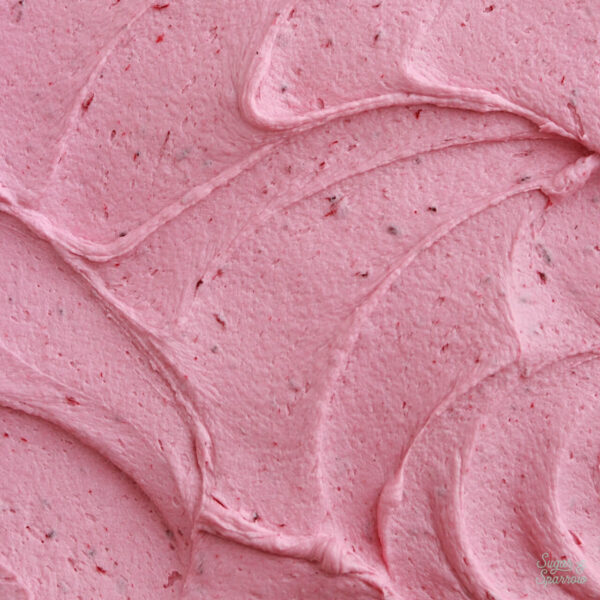 adding fresh blackberries to buttercream recipe