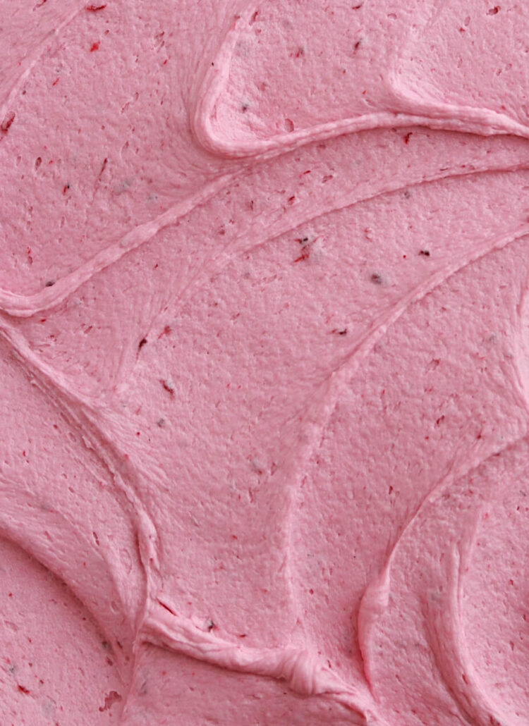 adding fresh blackberries to buttercream recipe