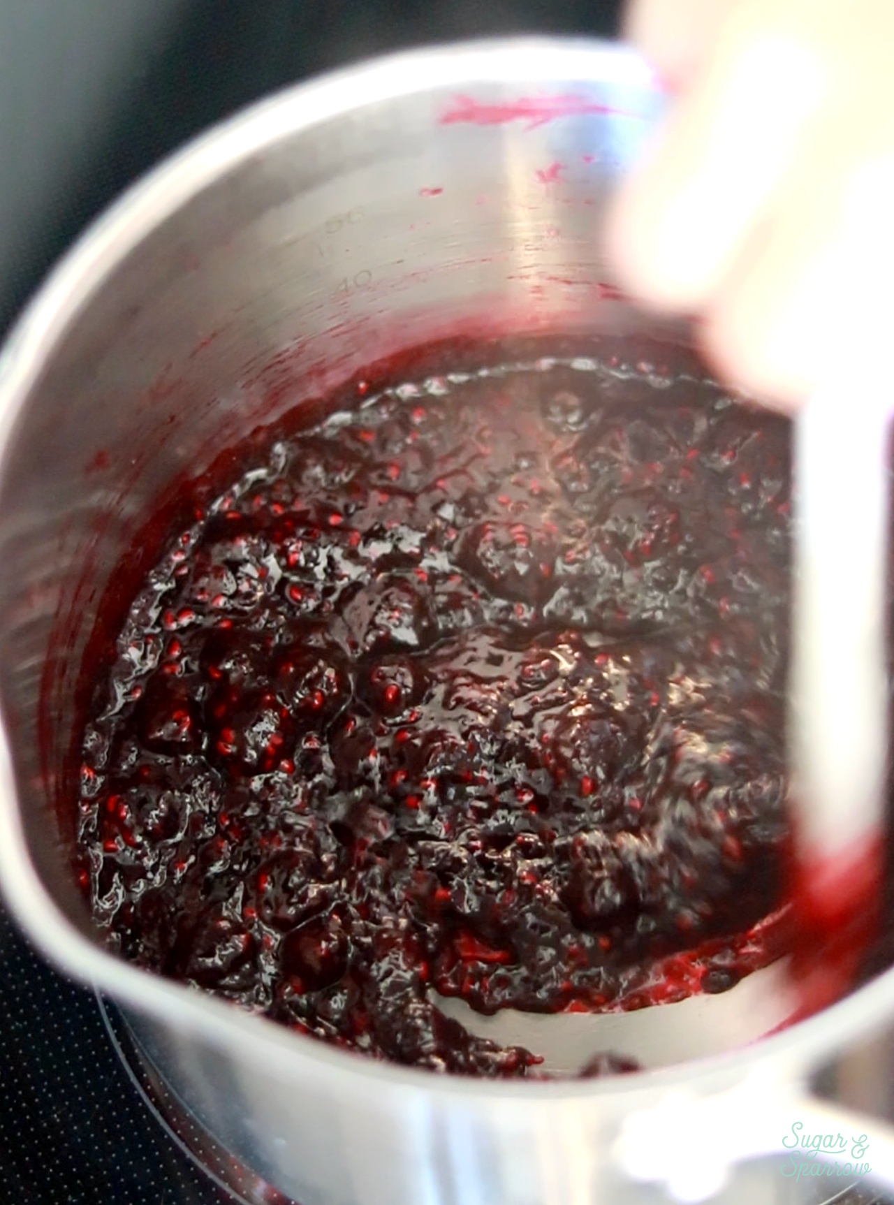 reducing berries to a jamlike consistency