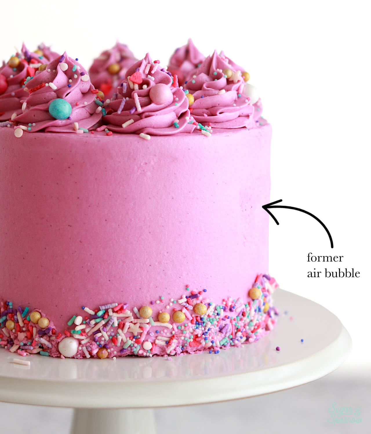 how to smooth an air bubble on decorated cake