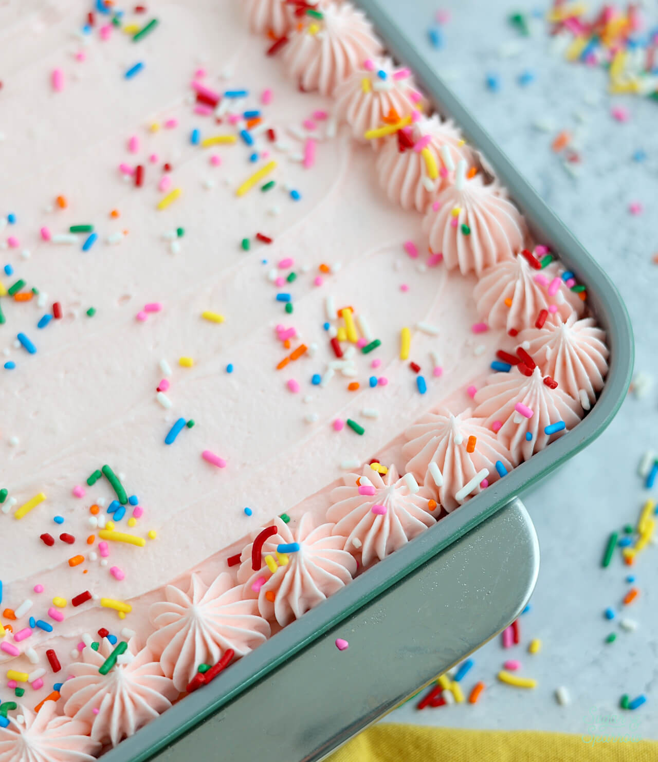 funfetti sheet cake with pink frosting