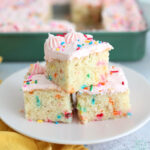 funfetti sheet cake slices with pink frosting