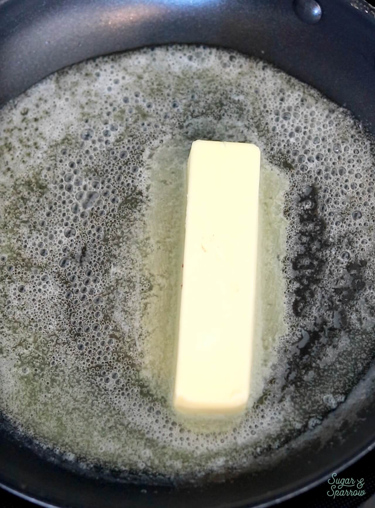 melting butter in a skillet