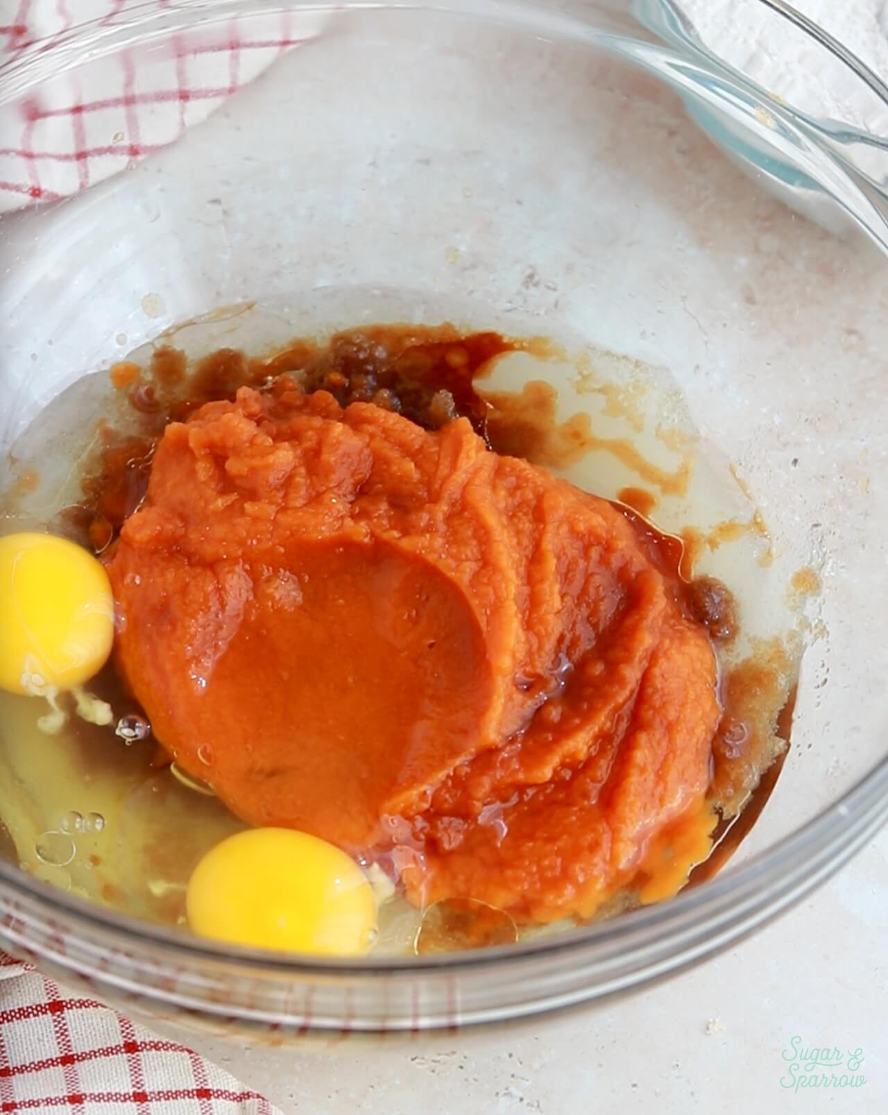 pumpkin cupcakes ingredients in a glass bowl