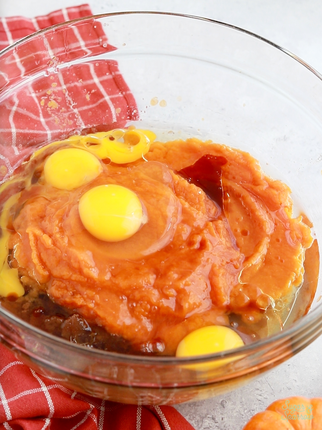 pumpkin cake ingredients in bowl