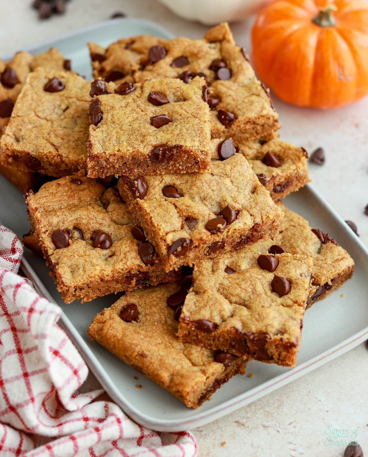 pumpkin chocolate chip cookie bars on a plate